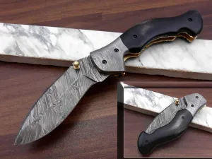 7.5" Folding Knife, 3.5" Legal Hand Forged Twist Pattern Damascus Steel Blade, Black and White Scales Available, Pocket Knife, Liner Lock & Thumb knob Equipped, Cow Hide Leather Sheath
