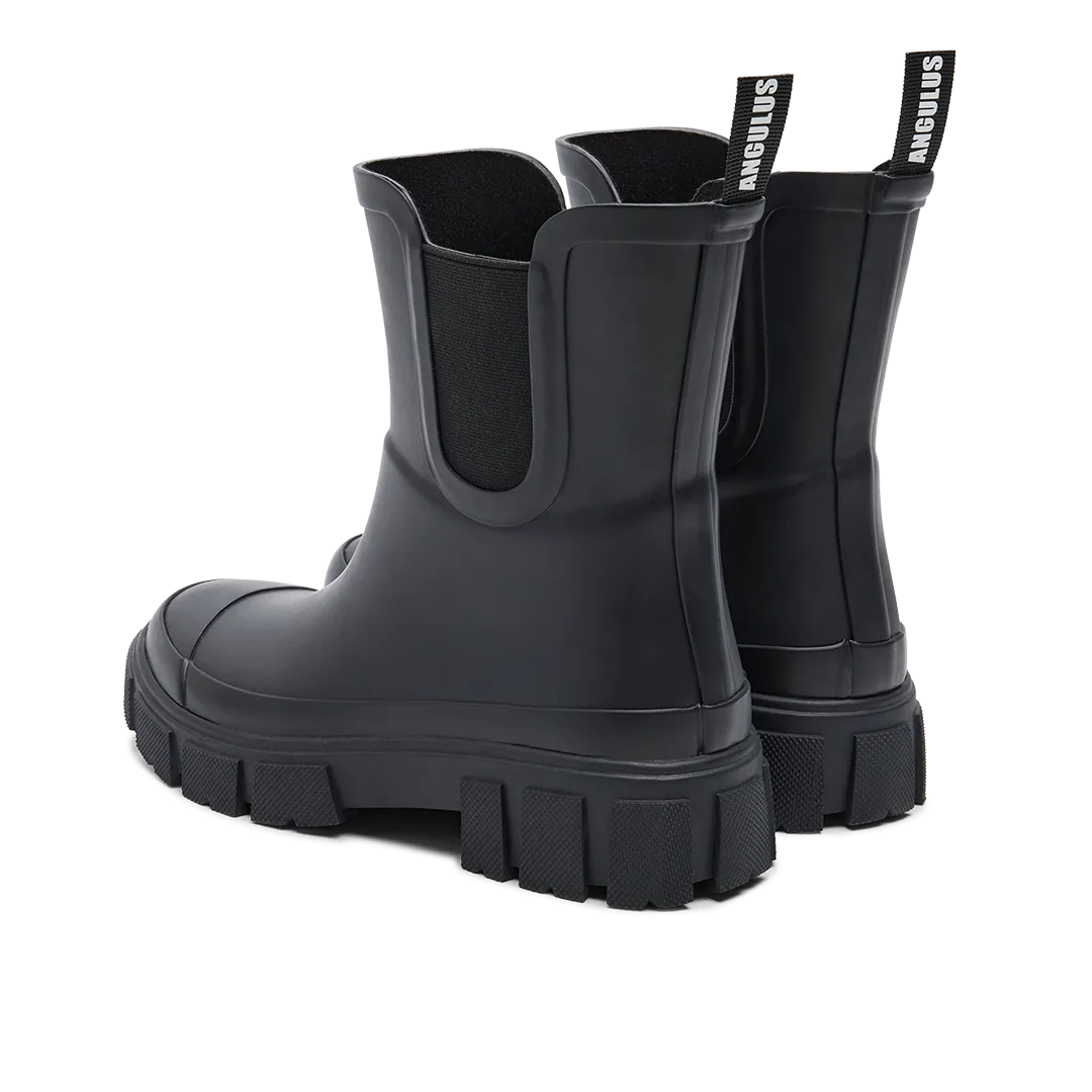 Rubber boot with a chunky track sole